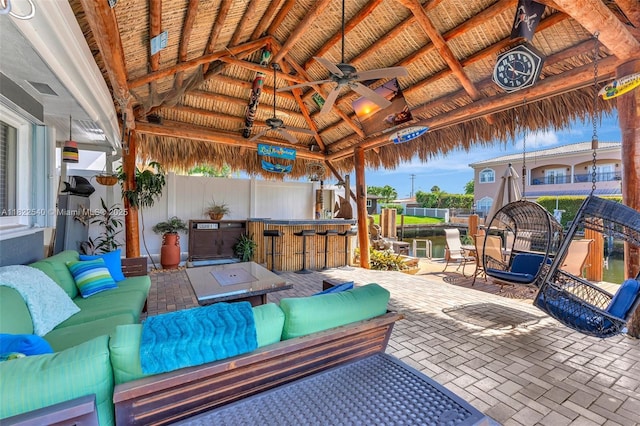 501 SE 7th Ave, Pompano Beach, FL 33060 - view of patio / terrace with outdoor lounge area, a gazebo, and a ceiling fan