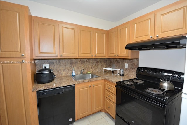 6500 Cypress Rd Unit 410, Plantation, FL 33317 - kitchen with black appliances, under cabinet range hood, tasteful backsplash, and light brown cabinets