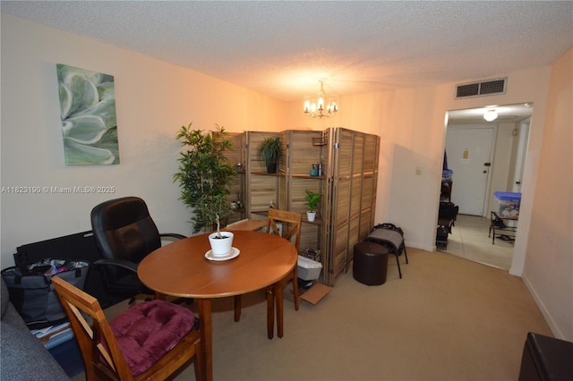 6500 Cypress Rd Unit 410, Plantation, FL 33317 - dining space with a chandelier, carpet, a textured ceiling, and an office area