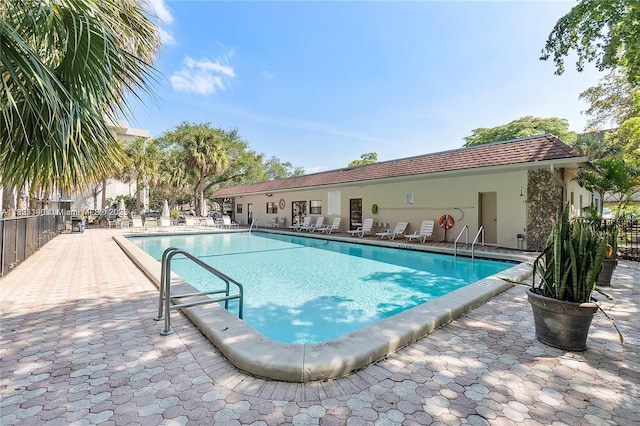 6500 Cypress Rd Unit 410, Plantation, FL 33317 - community pool featuring a patio area