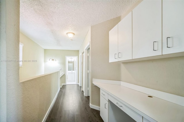 8995 SW 213th St, Cutler Bay, FL 33189 - hall with a textured ceiling and dark wood finished floors