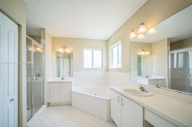 8995 SW 213th St, Cutler Bay, FL 33189 - full bath with a shower stall, two vanities, a whirlpool tub, and tile patterned floors
