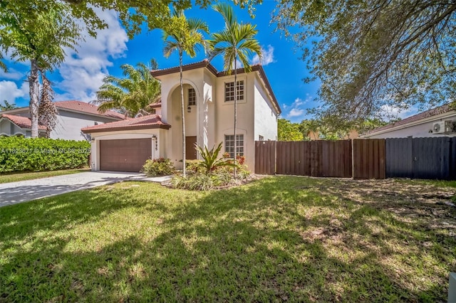 8995 SW 213th St, Cutler Bay, FL 33189 - mediterranean / spanish house with stucco siding, an attached garage, concrete driveway, and a tile roof