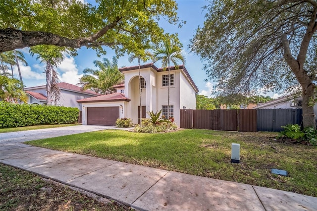 8995 SW 213th St, Cutler Bay, FL 33189 - mediterranean / spanish-style home featuring stucco siding, an attached garage, concrete driveway, and a tile roof