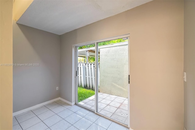 9537 SW 154th Ave, Miami, FL 33196 - doorway to outside with light tile patterned flooring and baseboards