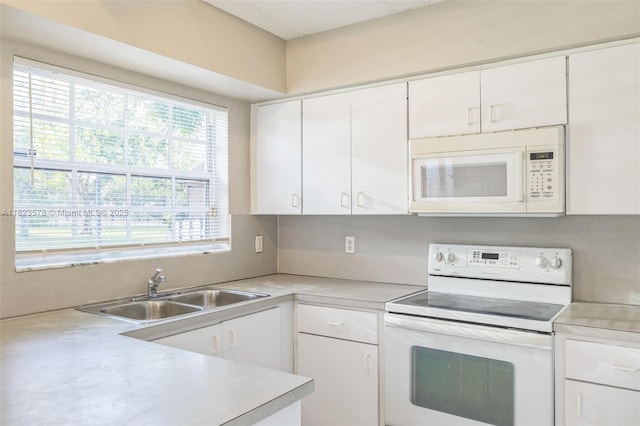 9537 SW 154th Ave, Miami, FL 33196 - kitchen featuring white appliances, light countertops, and white cabinetry