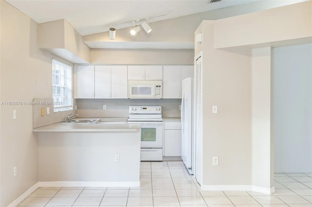 9537 SW 154th Ave, Miami, FL 33196 - kitchen featuring white appliances, a peninsula, white cabinetry, light countertops, and light tile patterned floors