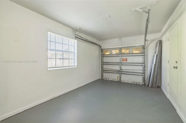 9537 SW 154th Ave, Miami, FL 33196 - garage featuring baseboards