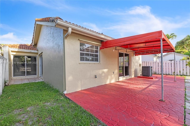 9537 SW 154th Ave, Miami, FL 33196 - rear view of property with stucco siding, a patio area, and a tiled roof