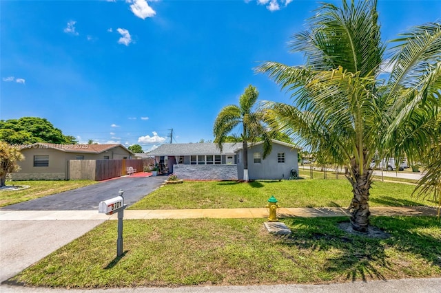 6701 NW 6th St, Margate, FL 33063 - ranch-style home featuring asphalt driveway and stucco siding