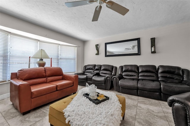 6701 NW 6th St, Margate, FL 33063 - living area featuring a textured ceiling, healthy amount of natural light, a ceiling fan, and light tile patterned floors