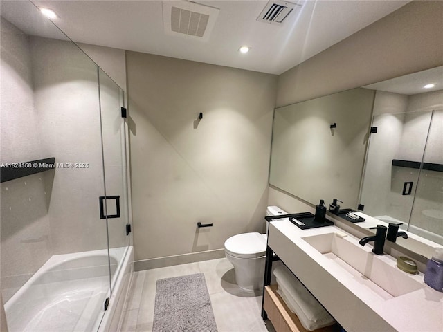 1010 SW 2nd Ave Unit 601, Miami, FL 33130 - bathroom with vanity, bath / shower combo with glass door, recessed lighting, and tile patterned flooring