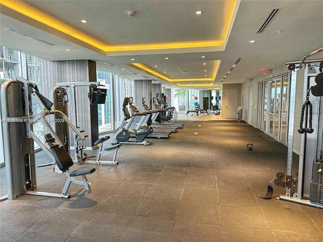 1010 SW 2nd Ave Unit 601, Miami, FL 33130 - gym with a raised ceiling and floor to ceiling windows
