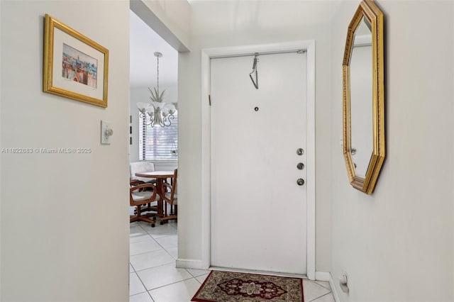 7121 Mimosa Way, Tamarac, FL 33321 - foyer featuring a chandelier and light tile patterned flooring