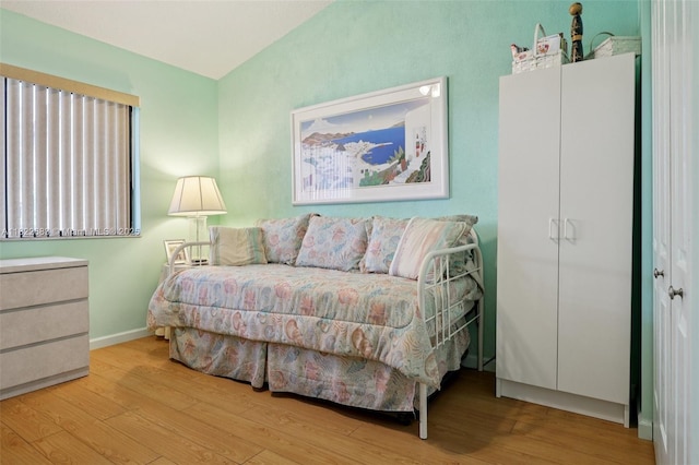7121 Mimosa Way, Tamarac, FL 33321 - bedroom featuring wood finished floors and vaulted ceiling