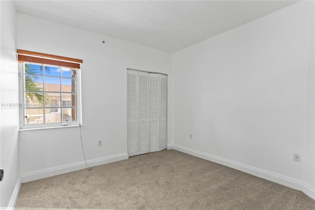 6445 SW 130th Pl Unit 612, Miami, FL 33183 - unfurnished bedroom featuring carpet flooring and a closet
