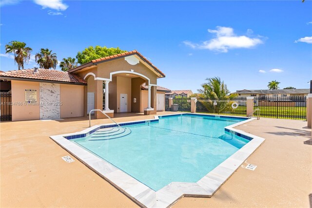 6445 SW 130th Pl Unit 612, Miami, FL 33183 - community pool featuring a patio