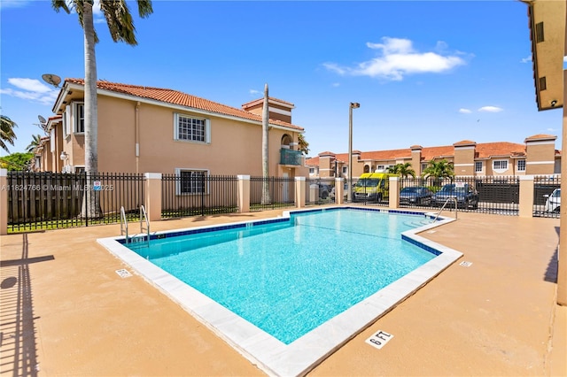 6445 SW 130th Pl Unit 612, Miami, FL 33183 - community pool with a residential view and a patio