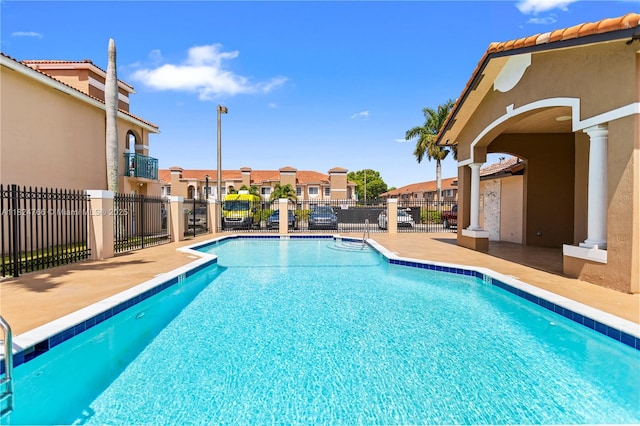 6445 SW 130th Pl Unit 612, Miami, FL 33183 - community pool with a residential view and a patio