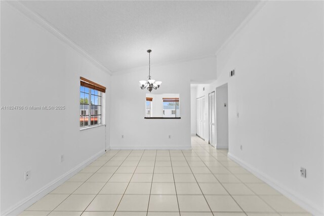6445 SW 130th Pl Unit 612, Miami, FL 33183 - empty room with crown molding and a chandelier