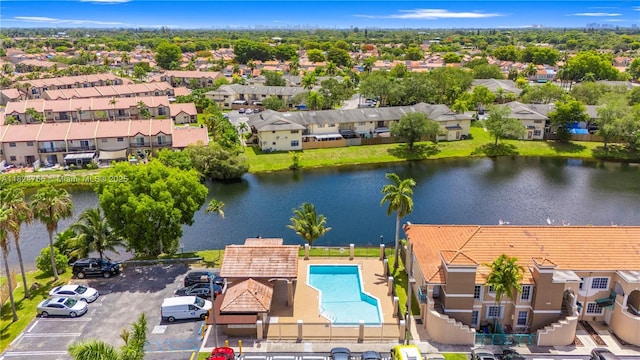 6445 SW 130th Pl Unit 612, Miami, FL 33183 - aerial perspective of suburban area with a nearby body of water and a pool area