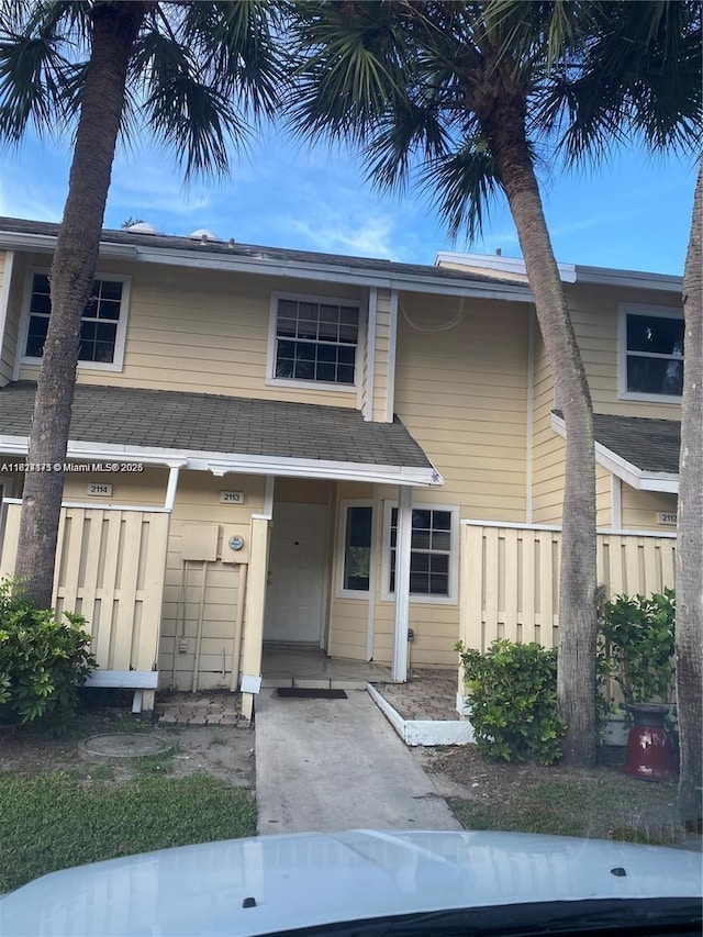 2113 Champions Unit 2113, North Lauderdale, FL 33068 - view of front of property with a porch