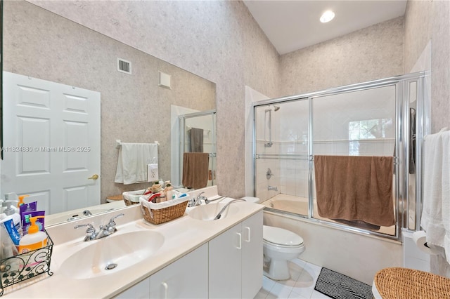18739 SW 28th St, Miramar, FL 33029 - bathroom featuring tile patterned floors, double vanity, and combined bath / shower with glass door