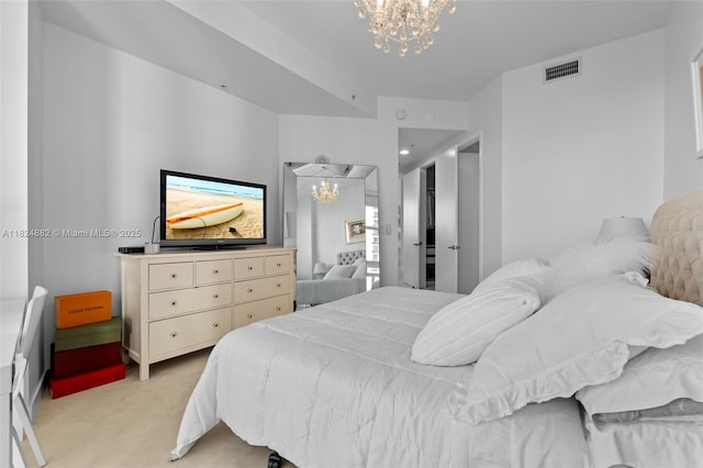 18201 Collins Ave Unit 201A, Sunny Isles Beach, FL 33160 - bedroom with a chandelier and light carpet