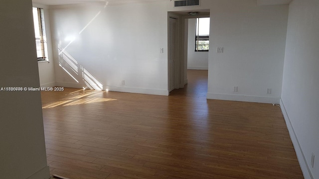 10000 Bay Harbor Ter Unit 502-A, Bay Harbor Islands, FL 33154 - unfurnished room with wood finished floors