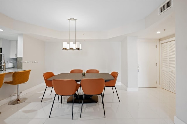 701 Brickell Key Blvd Unit 1605, Miami, FL 33131 - dining space featuring baseboards and recessed lighting