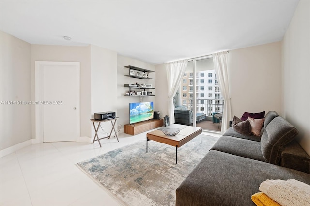 701 Brickell Key Blvd Unit 1605, Miami, FL 33131 - living area with baseboards and tile patterned flooring