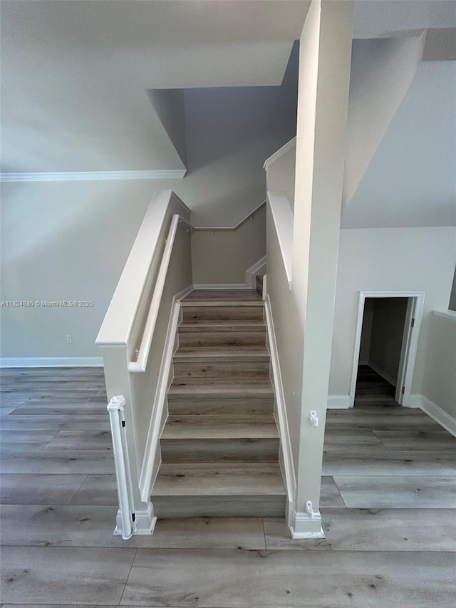 2921 NE 185th St Unit 1205, Aventura, FL 33180 - stairway featuring wood finished floors