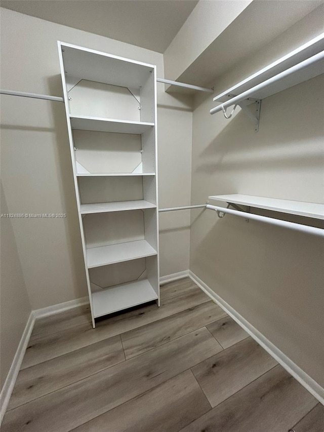 2921 NE 185th St Unit 1205, Aventura, FL 33180 - spacious closet with wood finished floors