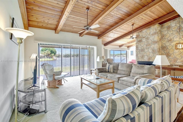 1600 SW 72nd Ave, Plantation, FL 33317 - carpeted living area featuring ceiling fan, wooden ceiling, and a stone fireplace