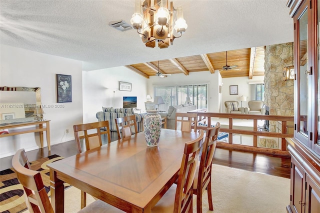 1600 SW 72nd Ave, Plantation, FL 33317 - dining space with wood ceiling, a textured ceiling, ceiling fan, a chandelier, and carpet floors