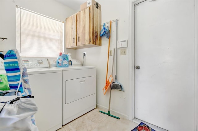 1600 SW 72nd Ave, Plantation, FL 33317 - washroom with washer and clothes dryer, cabinet space, and light tile patterned floors
