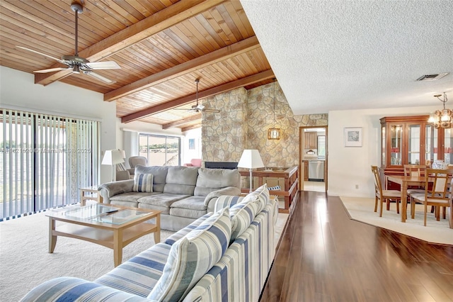 1600 SW 72nd Ave, Plantation, FL 33317 - living room with a ceiling fan, dark wood finished floors, a chandelier, and a fireplace