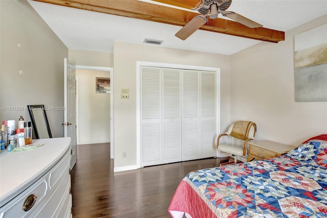 1600 SW 72nd Ave, Plantation, FL 33317 - bedroom featuring dark wood-type flooring, a closet, ceiling fan, and a textured ceiling