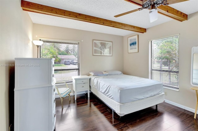 1600 SW 72nd Ave, Plantation, FL 33317 - bedroom featuring beamed ceiling, dark wood-style flooring, and a ceiling fan