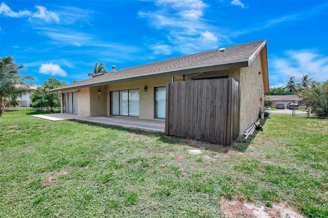 1600 SW 72nd Ave, Plantation, FL 33317 - back of house with a patio area, stucco siding, and a yard