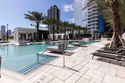 851 NE 1st Ave Unit 503, Miami, FL 33132 - community pool featuring a patio