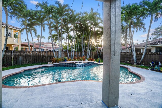 3610 SW 167th Ter, Miramar, FL 33027 - view of swimming pool featuring a fenced backyard, a patio area, and an outdoor hot tub