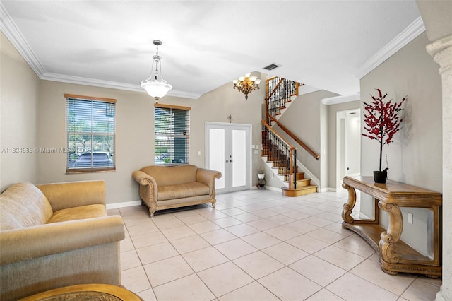 3610 SW 167th Ter, Miramar, FL 33027 - living area with french doors, light tile patterned floors, stairs, and crown molding