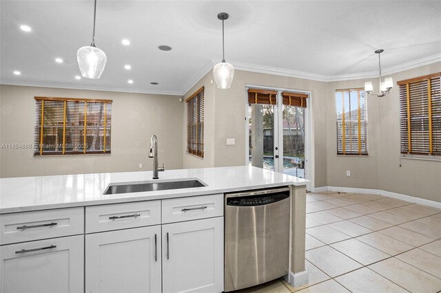 3610 SW 167th Ter, Miramar, FL 33027 - kitchen featuring dishwasher, light countertops, white cabinetry, ornamental molding, and decorative light fixtures