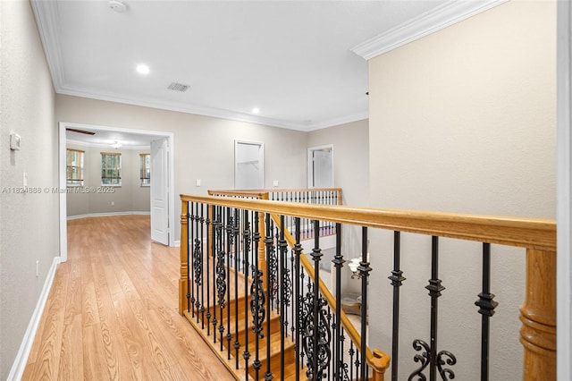 3610 SW 167th Ter, Miramar, FL 33027 - hall featuring light wood-style floors, an upstairs landing, ornamental molding, and recessed lighting
