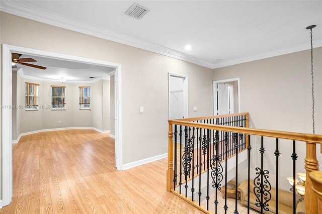 3610 SW 167th Ter, Miramar, FL 33027 - hall with an upstairs landing, crown molding, light wood finished floors, and recessed lighting