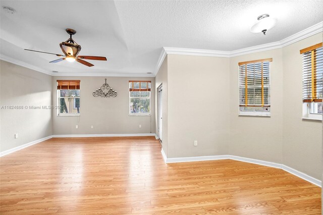 3610 SW 167th Ter, Miramar, FL 33027 - spare room with light wood-style floors, a ceiling fan, crown molding, a textured ceiling, and a smoke detector