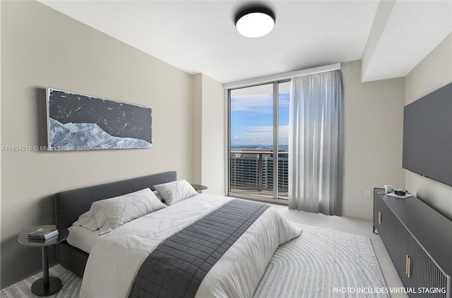 488 NE 18th St Unit 4112, Miami, FL 33132 - carpeted bedroom featuring floor to ceiling windows