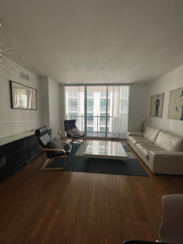 4100 Salzedo St Unit 809, Coral Gables, FL 33146 - living area featuring wood finished floors and expansive windows