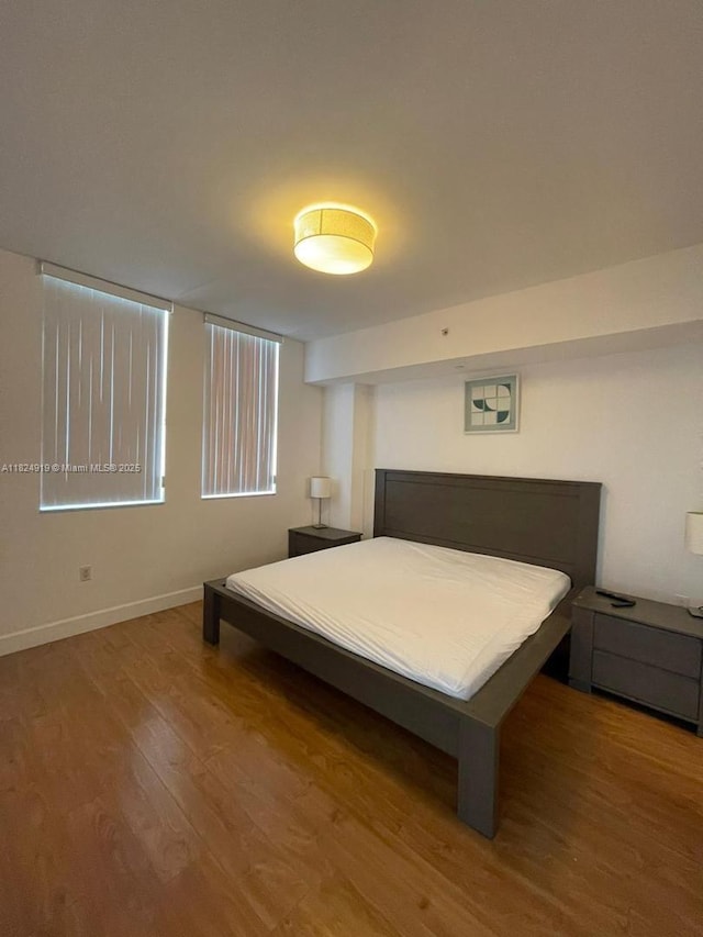 4100 Salzedo St Unit 809, Coral Gables, FL 33146 - bedroom with wood finished floors and baseboards
